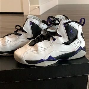 Girls Jordan’s with purple and black details